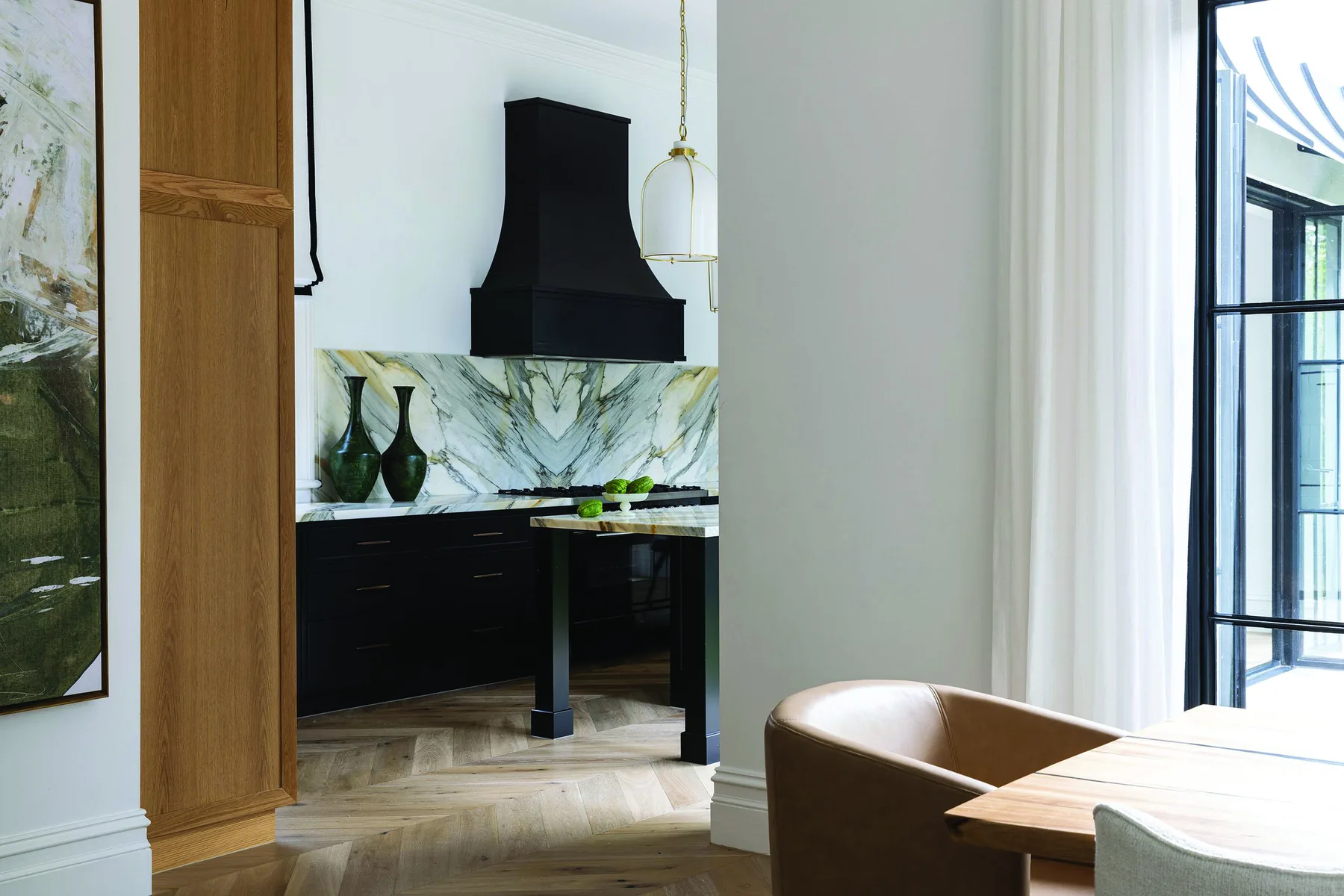Mosman 01 &mdash; kitchen and dining area with black rangehood and timber joinery