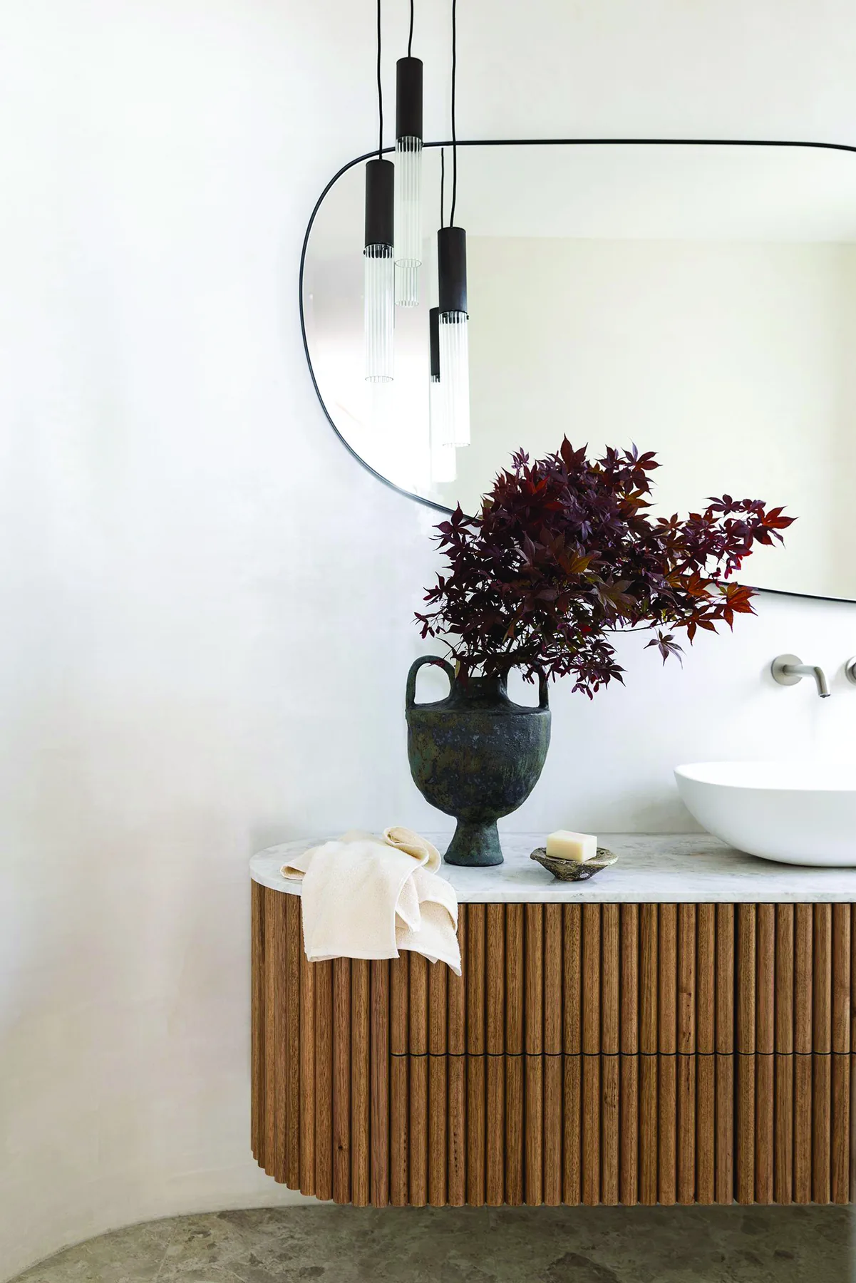 Mosman 02 &mdash; powder room with fluted timber floating vanity, round mirror and black pendants